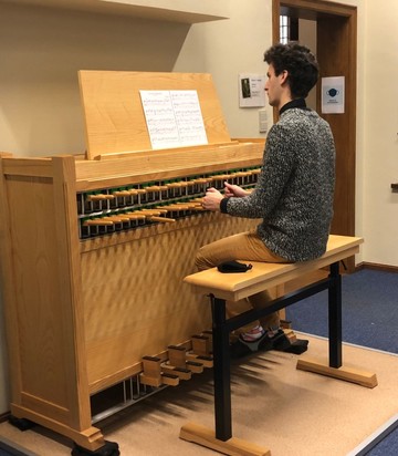 Carillon student at a practice keyboard